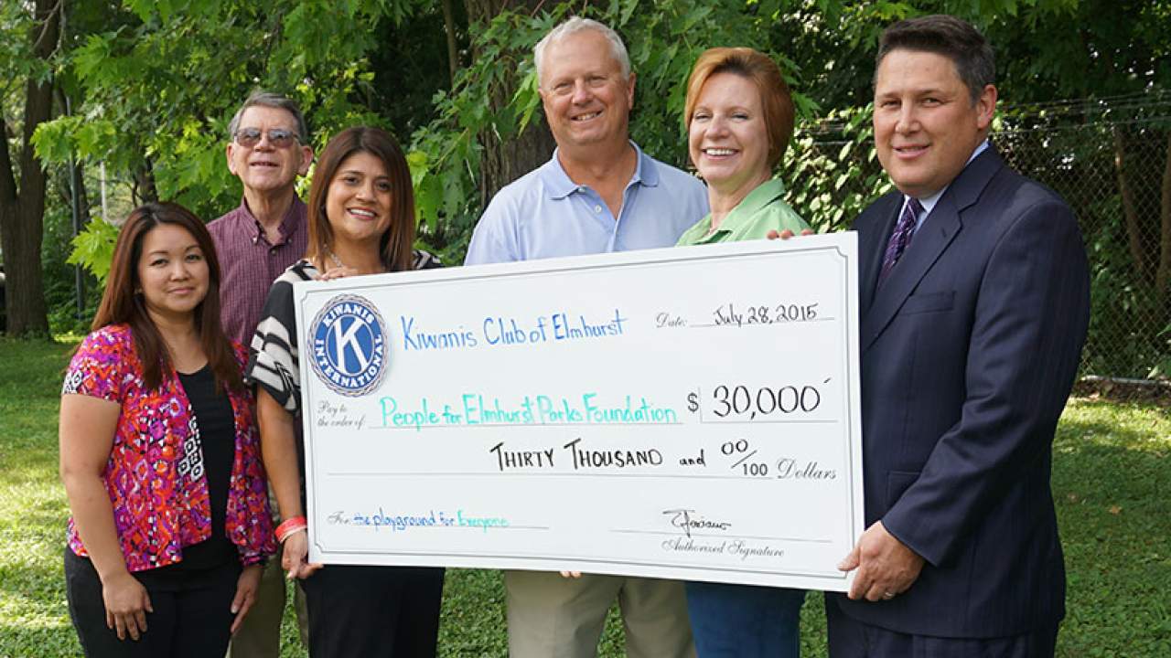 The Kiwanis Club of Elmhurst present check to the People for Elmhurst Parks Foundation. From left to right: Emmylou Feliciano, Treasurer; Jim Williams, Division 9 Lt. Governor; Angela Villegas, President Elect; Pete Goworowski, President of The People for Elmhurst Parks Foundation; Anne Quigley, Immediate Past President; Ted Barnhart, President.