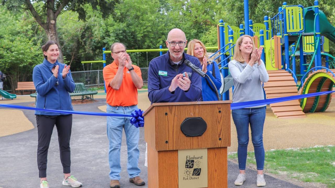Ribbon cutting celebrates new Ben Allison Park playground, Jim Rogers Executive Director