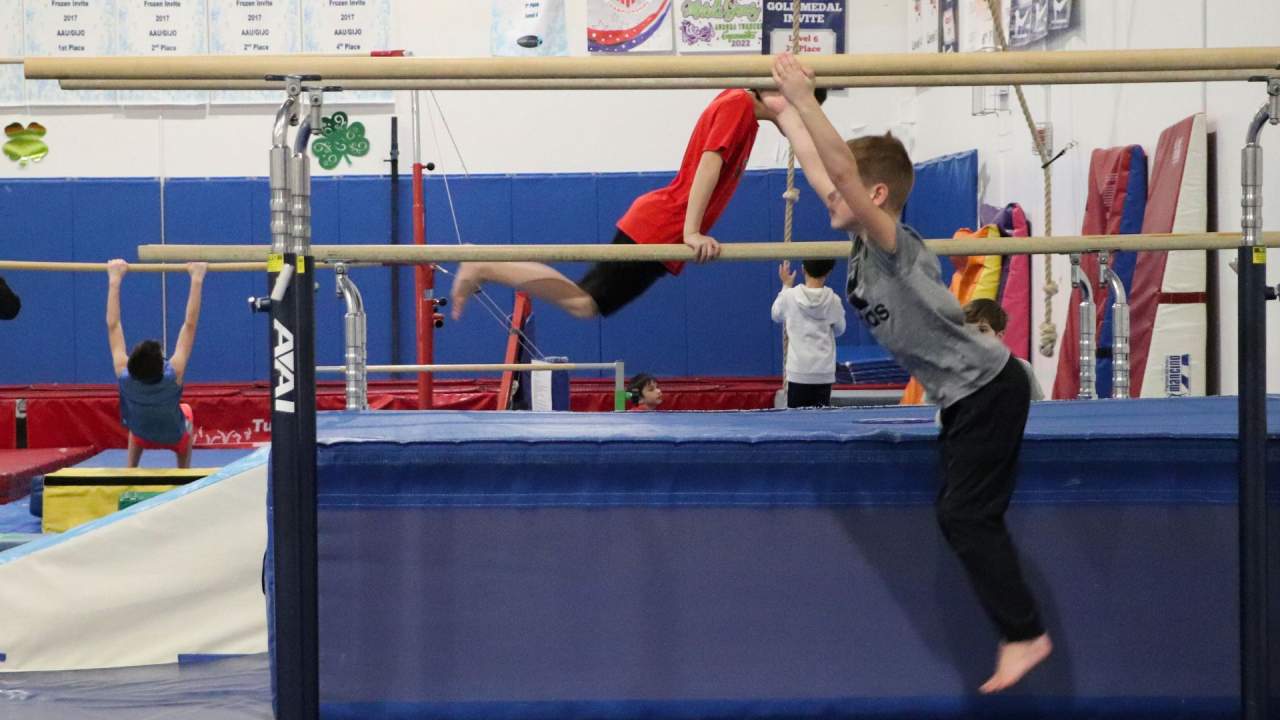 gymnast on parallel bars