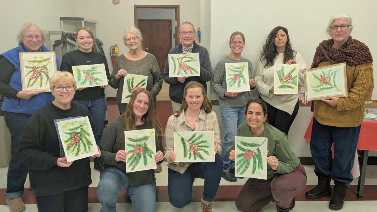 Watercolor painting class displays its finished art