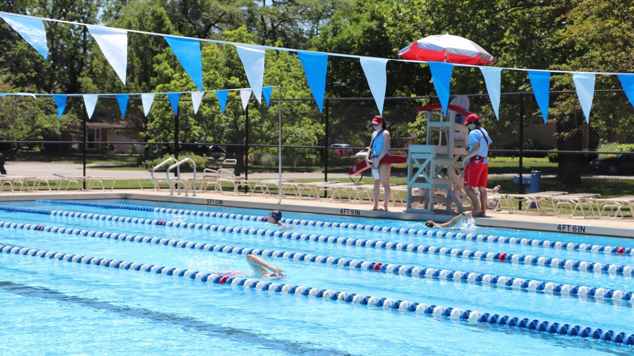 A lap pool with swimmers.