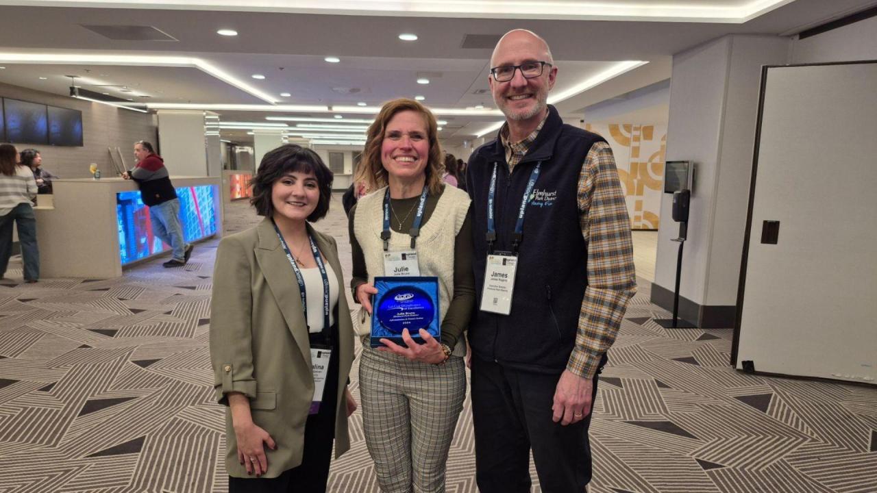 Julie Bruns as presented with the inaugural Liz Cox SIGnificance of Excellence Award