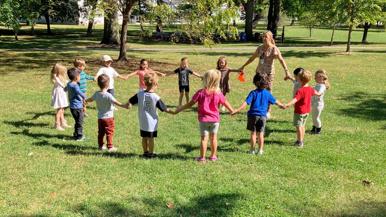 Preschoolers playing a game at the park
