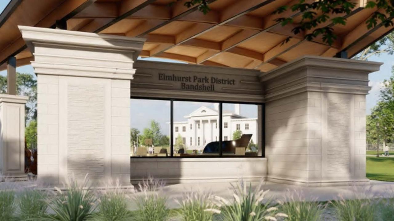 The rendering of the back of the bandshell with stone pillars and a wooden roof. Through the windows, Wilder Mansion is visible.