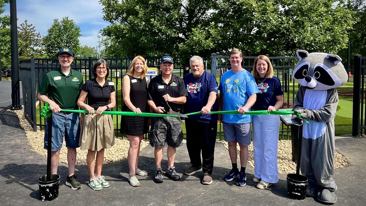 A ribbon cutting was held in June 2026 to celebrate the return of mini golf to The Hub. Board Commissioners and Staff stand in front of new mini golf course at The Hub at Berens Park